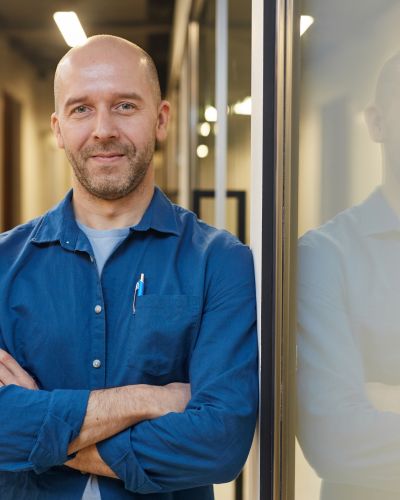 Bald Adult Man Posing Confidently